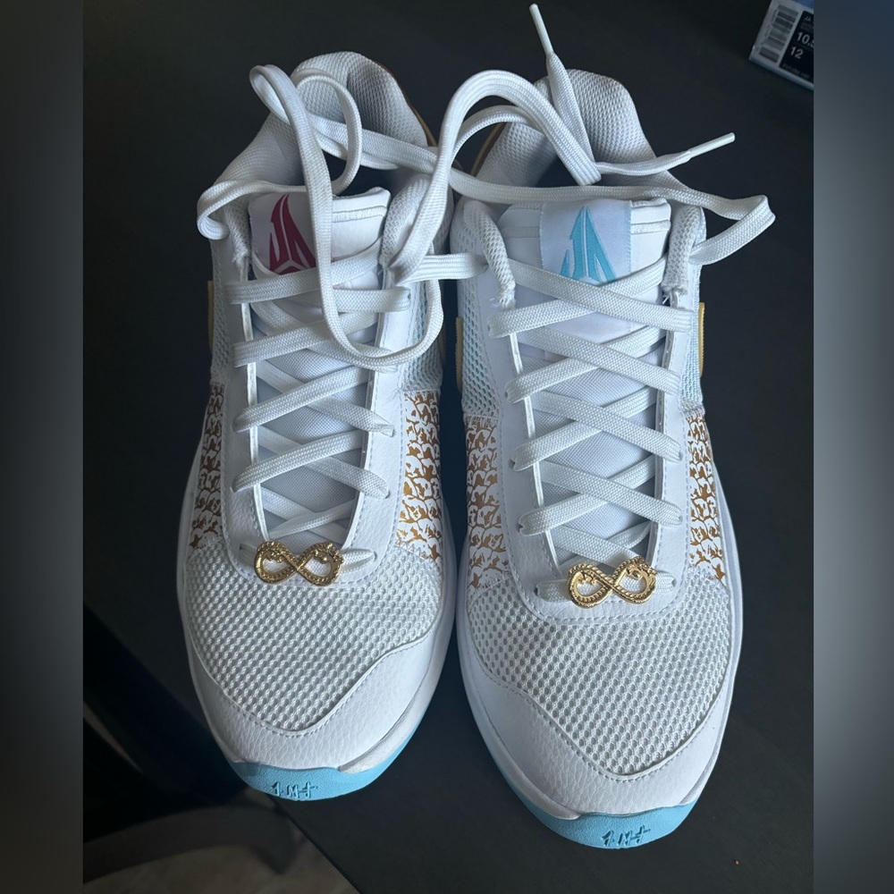 JA 1 White and Metallic Gold basketball shoes
